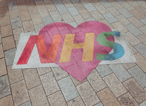 Decorative image of a colourful NHS logo
